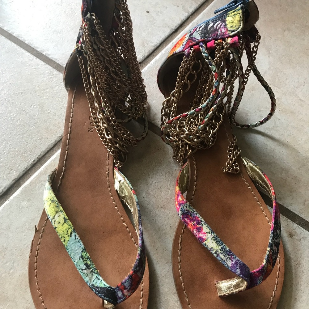 Sandals with chains around ankle